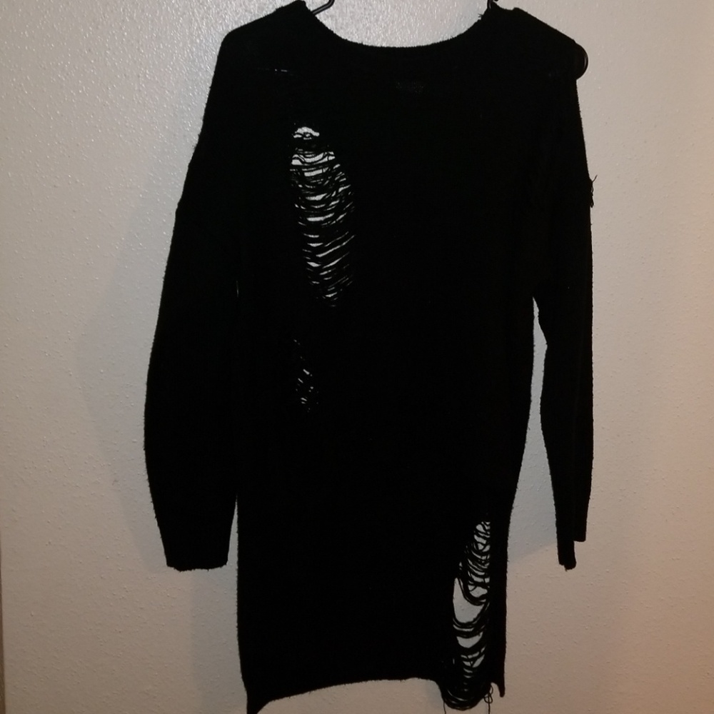 Ripped sweater fits large/med